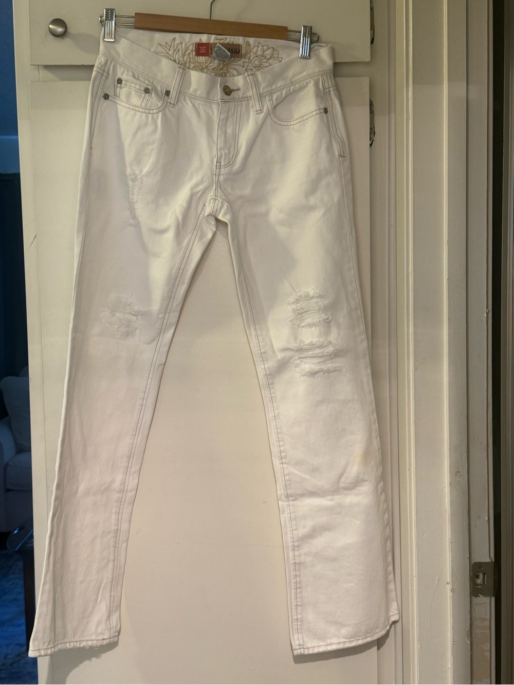 Y2K one hundred percent cotton low rise flared distressed jeans